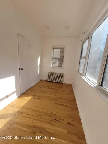 a bathroom with a toilet sink and shower