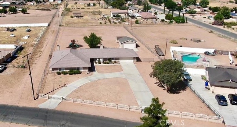 21291 Ramona Road Apple Valley, CA 92307 - Photo 2 of 35 an aerial view of a house with a swimming pool
