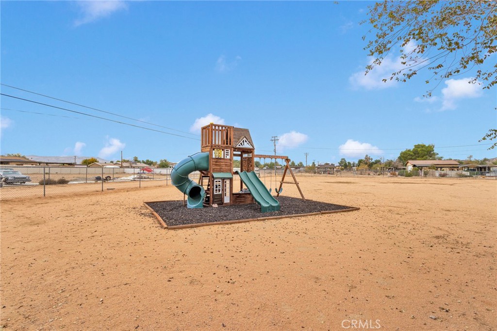 21291 Ramona Road Apple Valley, CA 92307 - Photo 29 of 35 a view of a lake with a beach