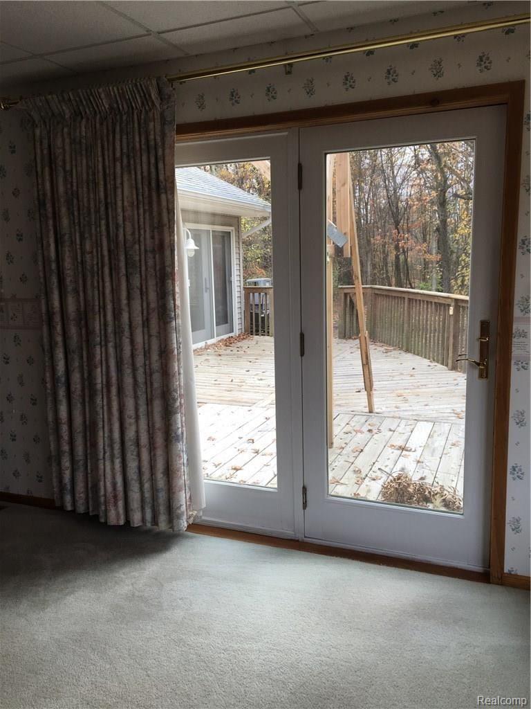 3175 Fisher Road Howell, MI 48855 - Photo 14 of 32 Master bedroom with door to back deck.