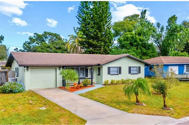 a house view with a garden space