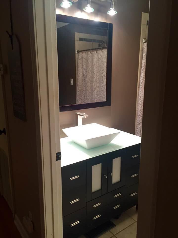 8026 Cedar Grove Road Cross Plains, TN 37049 - Photo 14 of 30 a bathroom with a sink vanity and a mirror