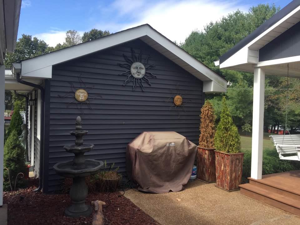 8026 Cedar Grove Road Cross Plains, TN 37049 - Photo 20 of 30 a front view of a house with garden