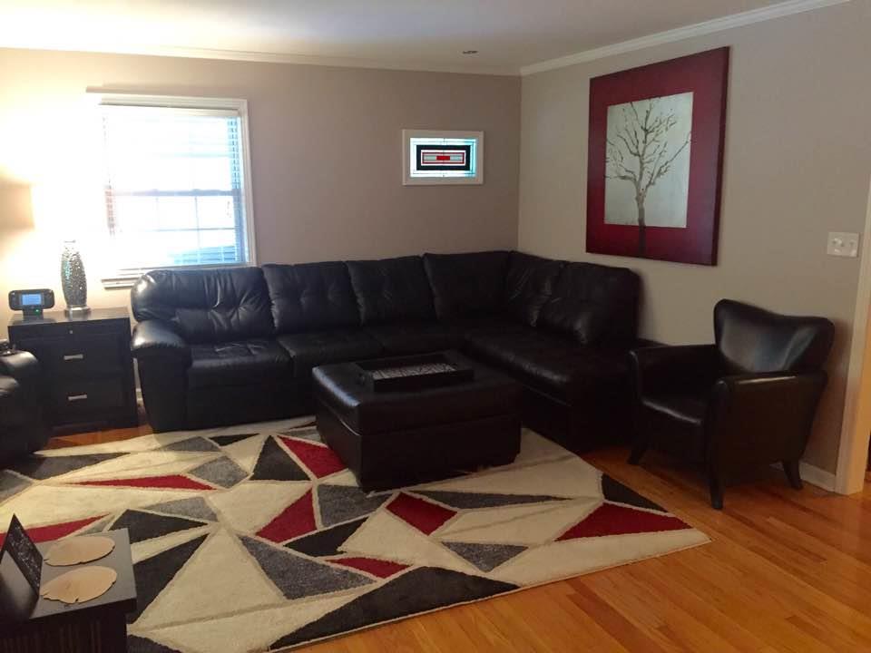 8026 Cedar Grove Road Cross Plains, TN 37049 - Photo 8 of 30 a living room with a couch wooden floor and a table