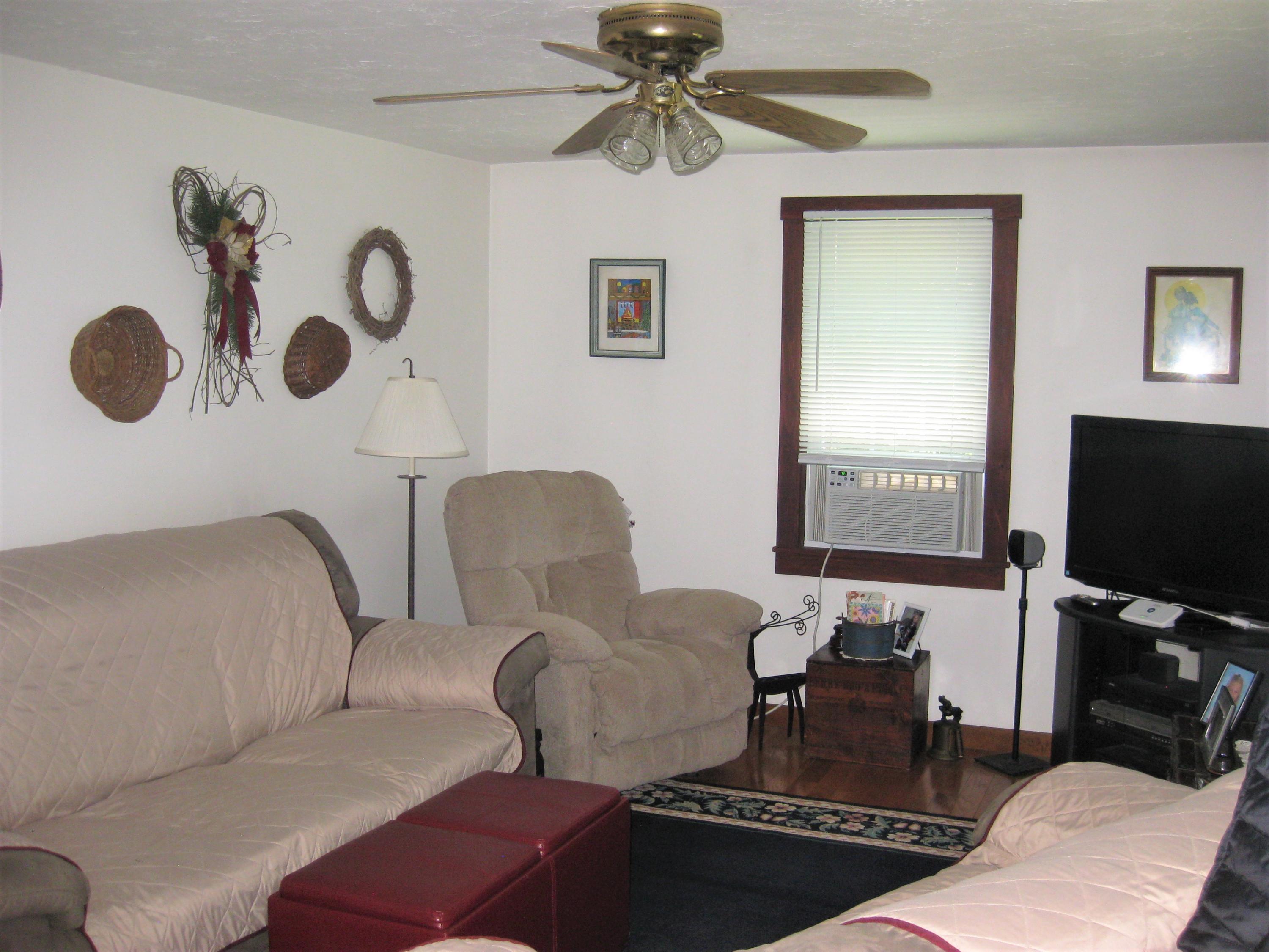 46-a B Standish Road Sagamore Beach, MA 02562 - Photo 19 of 31 a living room with furniture and a flat screen tv