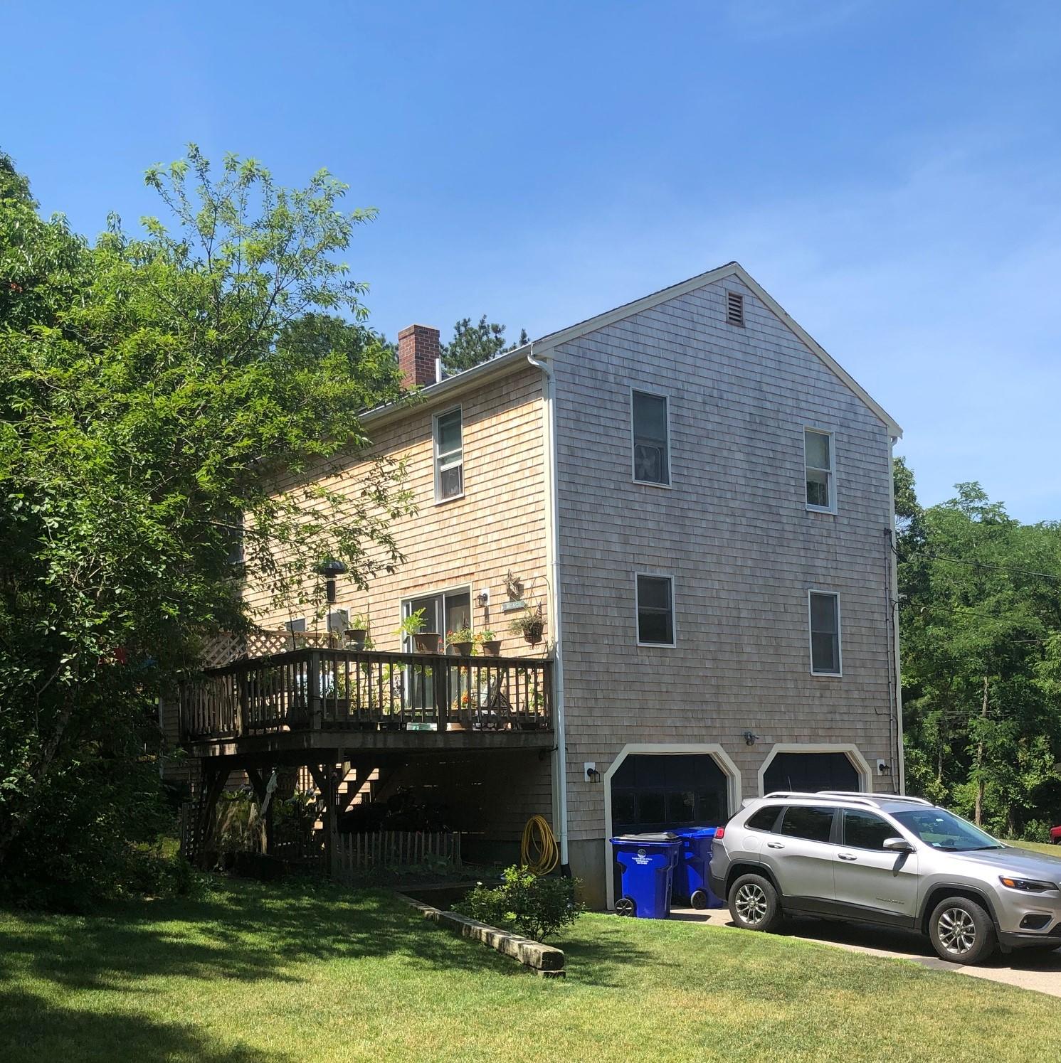 46-a B Standish Road Sagamore Beach, MA 02562 - Photo 2 of 31 a car parked in front of a house