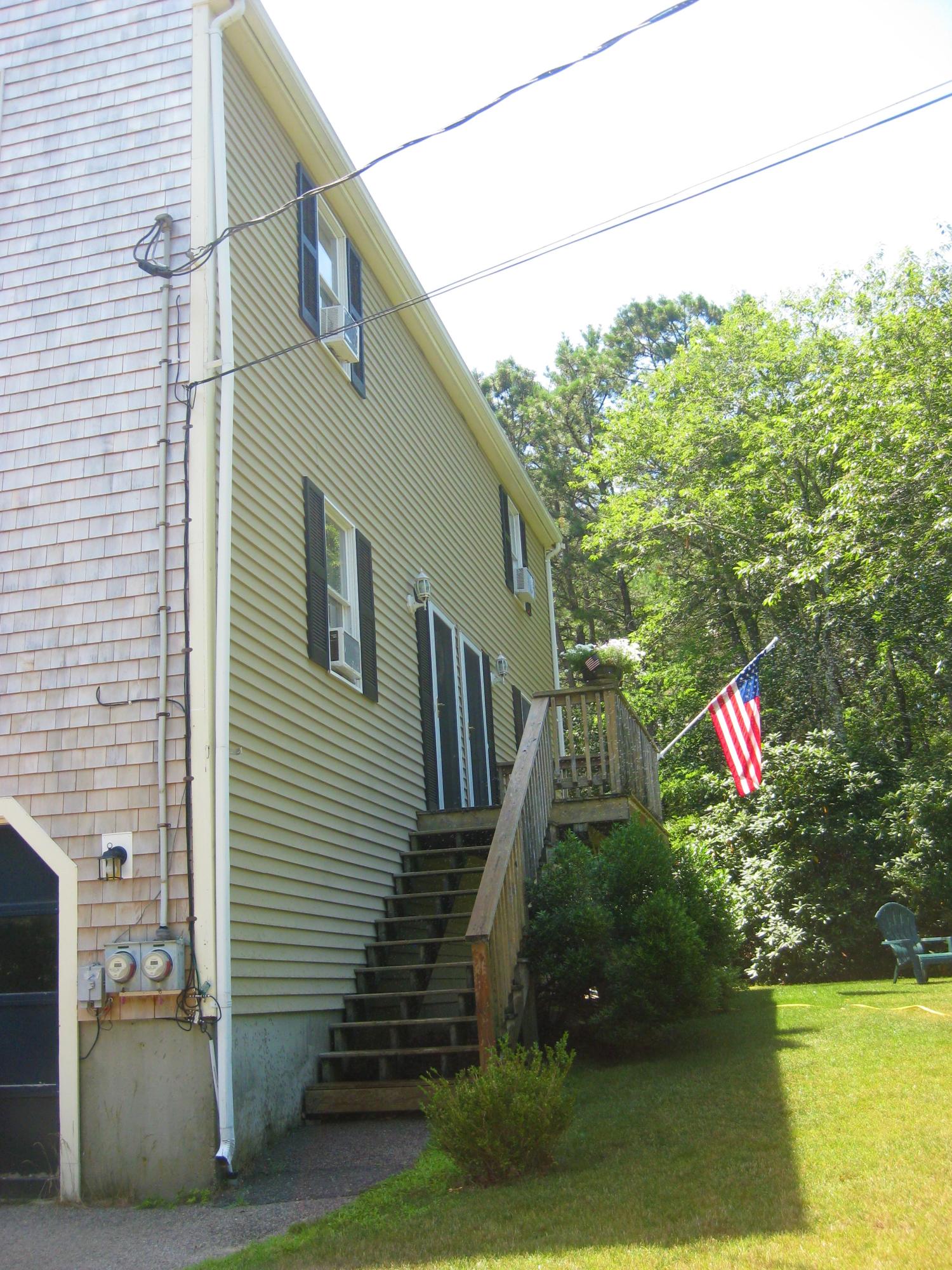 46-a B Standish Road Sagamore Beach, MA 02562 - Photo 4 of 31 a backyard of a house with lots of green space