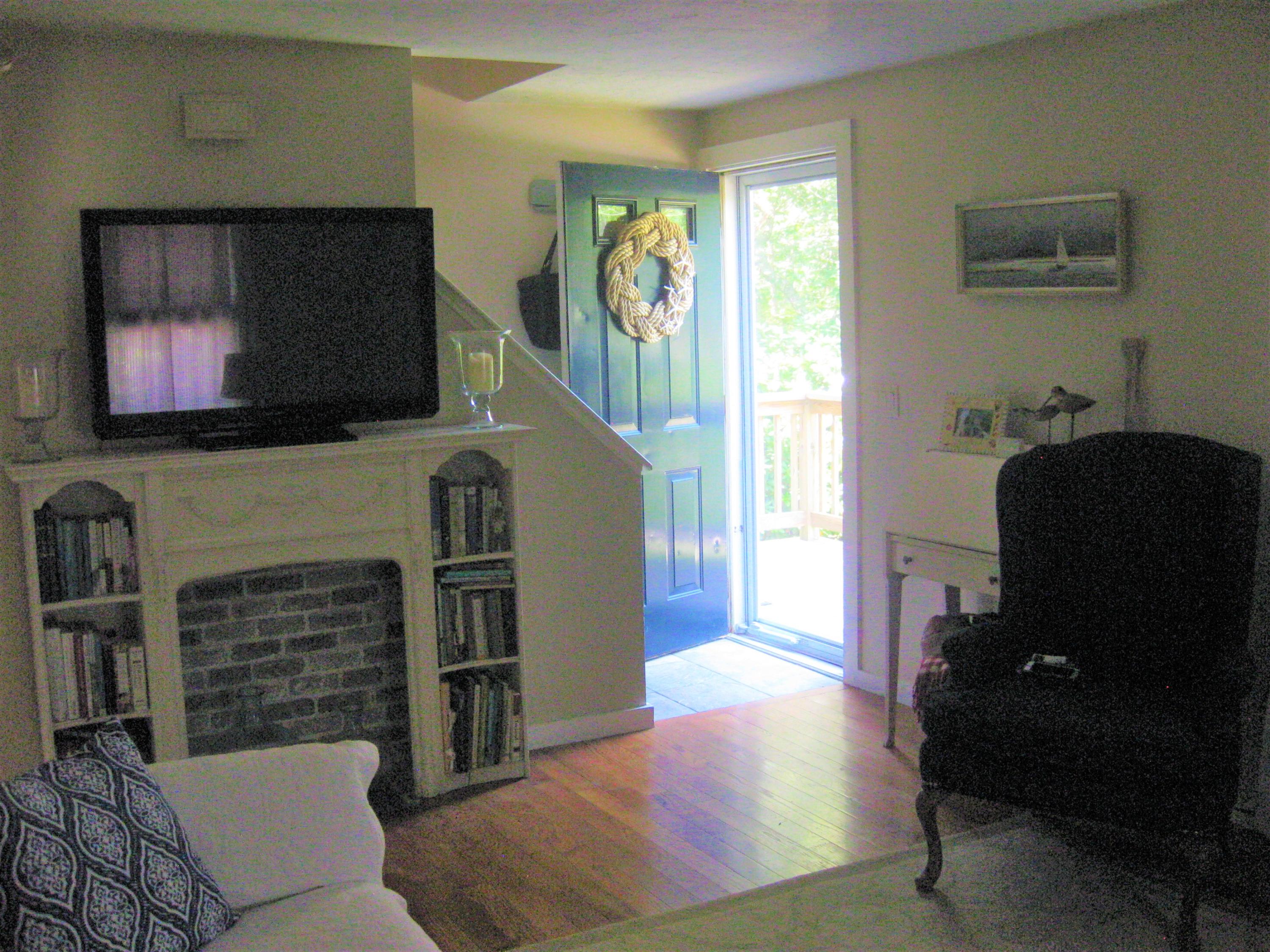 46-a B Standish Road Sagamore Beach, MA 02562 - Photo 5 of 31 a living room with furniture and a flat screen tv