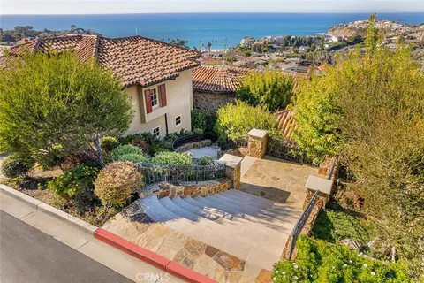 view of a house with a yard