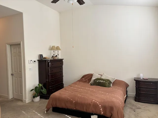 a bathroom with a tub and sink