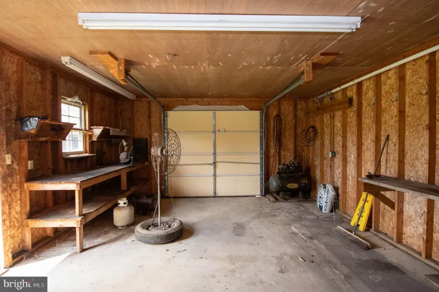 a view of room with gym equipment