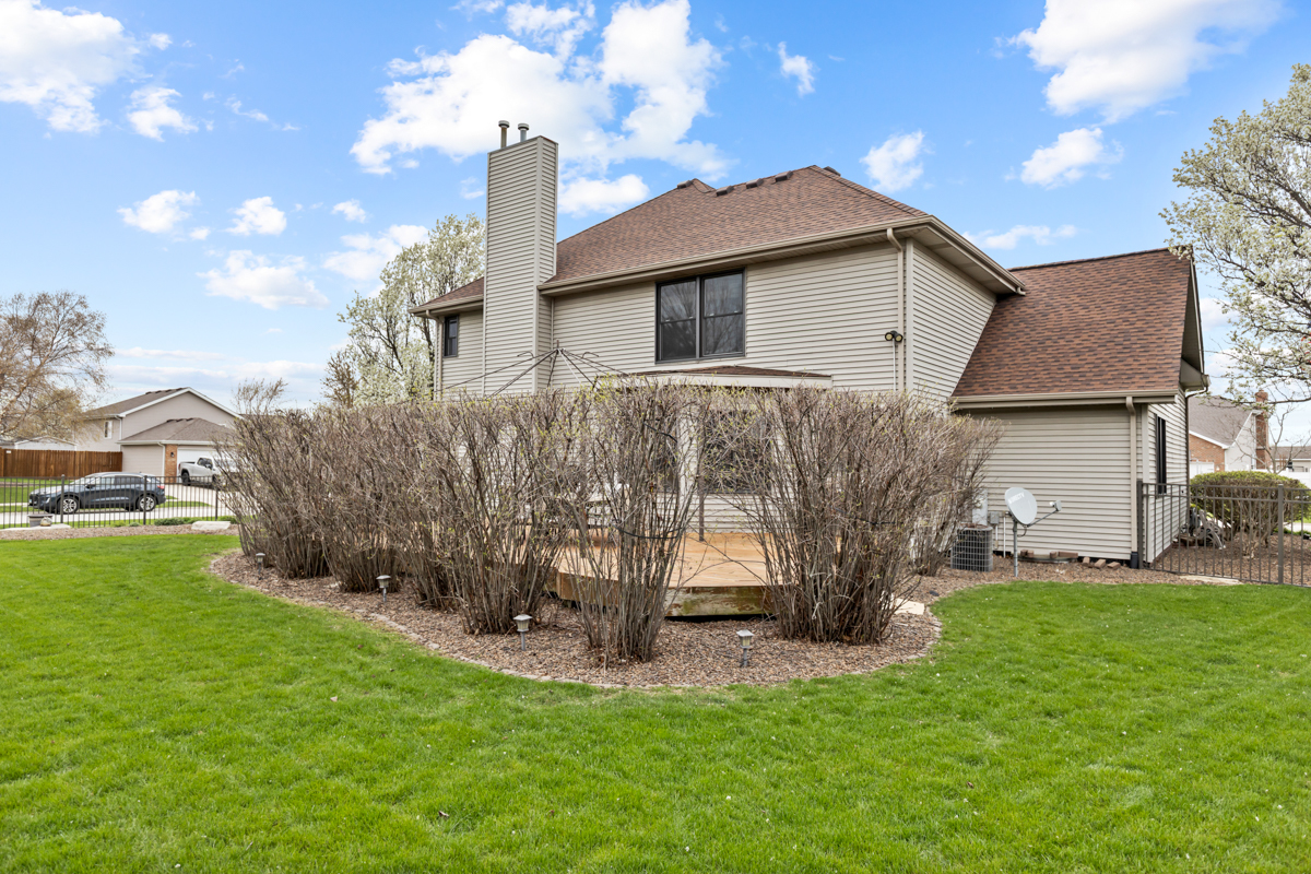 24854 Buttercup Lane Manhattan, IL 60442 - Photo 34 of 36 a view of a house with a yard