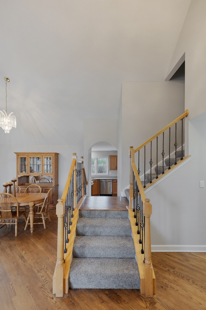 24854 Buttercup Lane Manhattan, IL 60442 - Photo 6 of 36 a view of entryway and hall with wooden floor