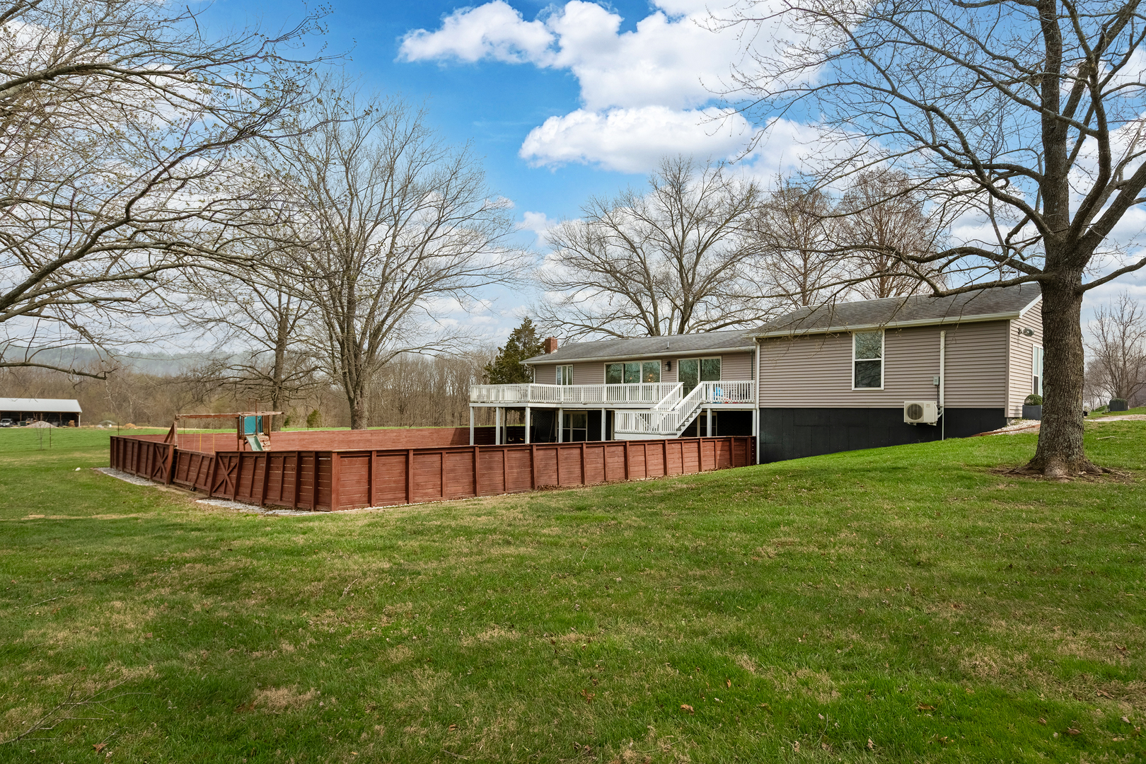 2930 Campground Road Anna, IL 62906 - Photo 14 of 81 a view of a house with a big yard and large trees