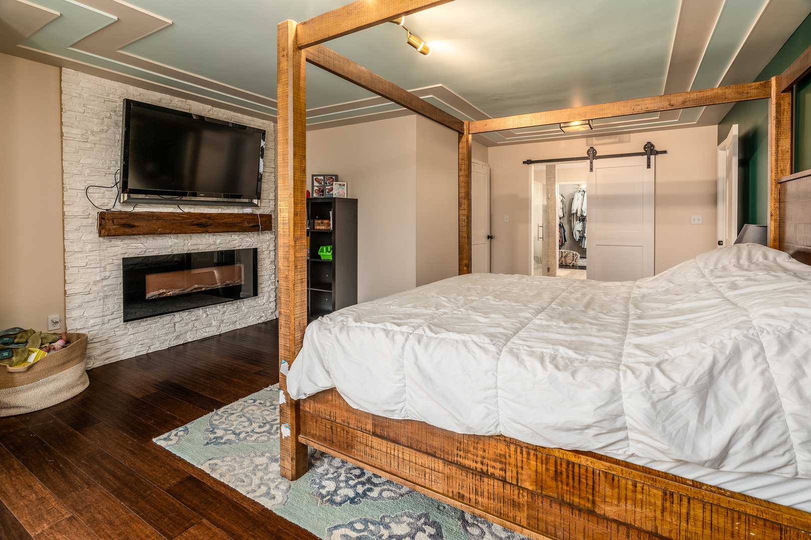 2930 Campground Road Anna, IL 62906 - Photo 51 of 81 a spacious bedroom with a bed and a flat screen tv