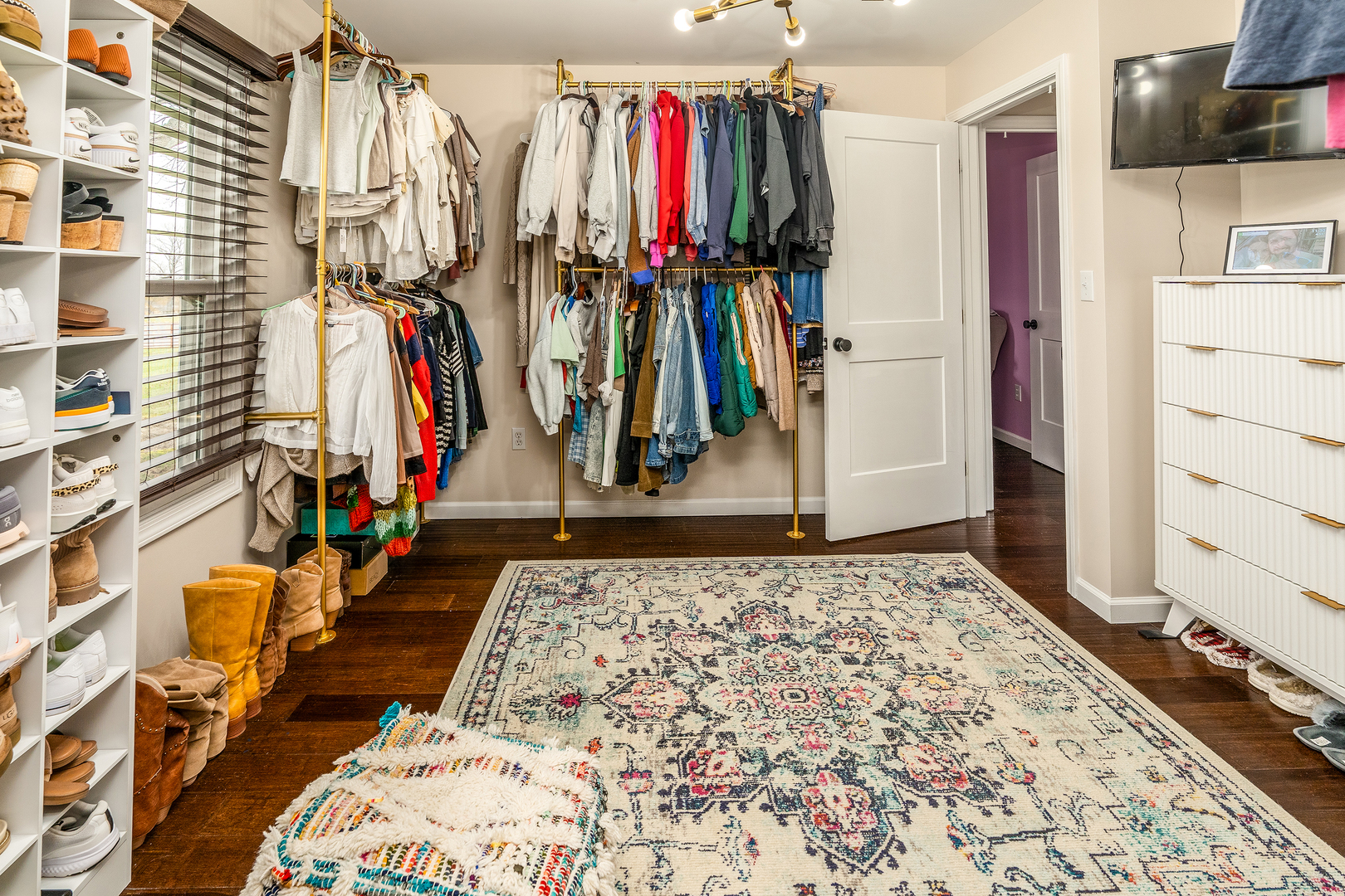 2930 Campground Road Anna, IL 62906 - Photo 58 of 81 a view of walk in closet with clothes and shoes