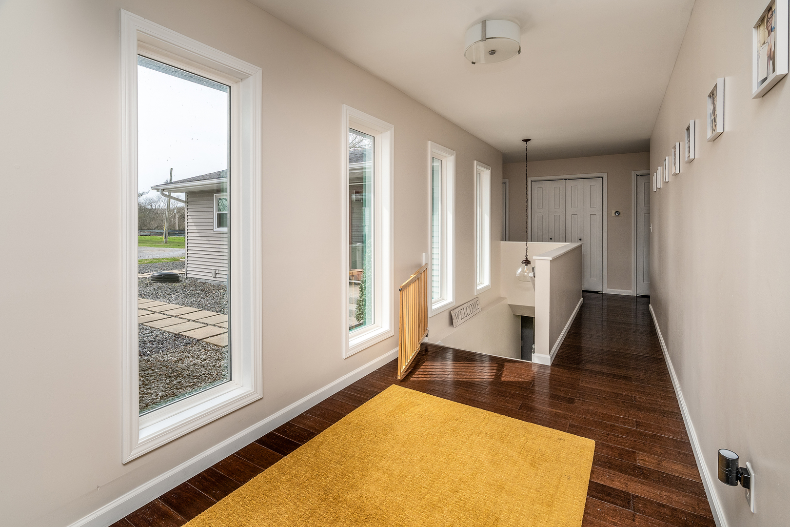 2930 Campground Road Anna, IL 62906 - Photo 64 of 81 a view of an empty room with wooden floor and a window