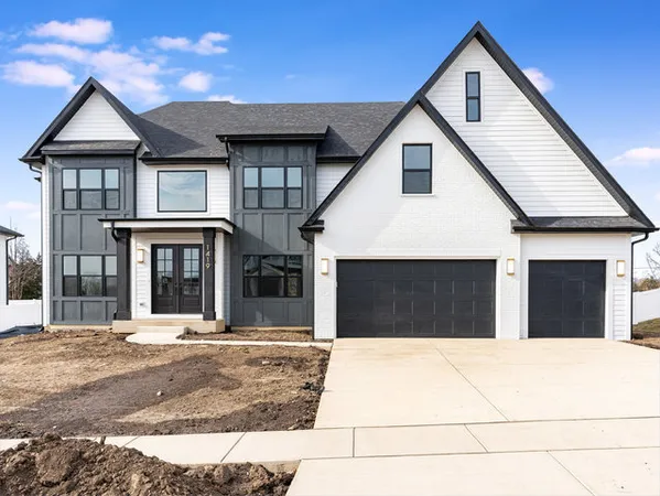 a front view of a house with a outdoor space