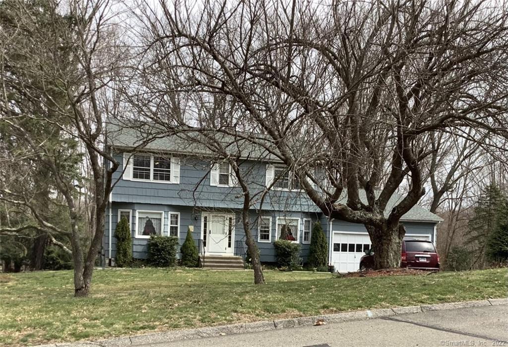 54 Salem Road Trumbull, CT 06611 - Photo 1 of 1 a front view of a house with a yard
