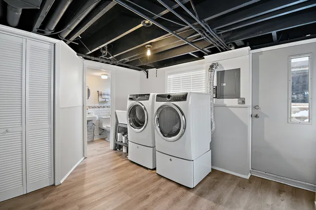 a utility room with dryer and washer