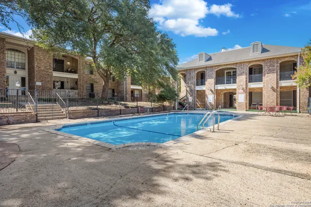 a view of outdoor space yard and swimming pool