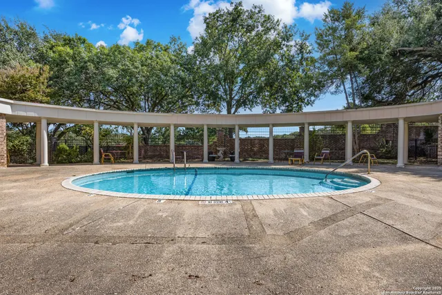a view of outdoor space yard and swimming pool