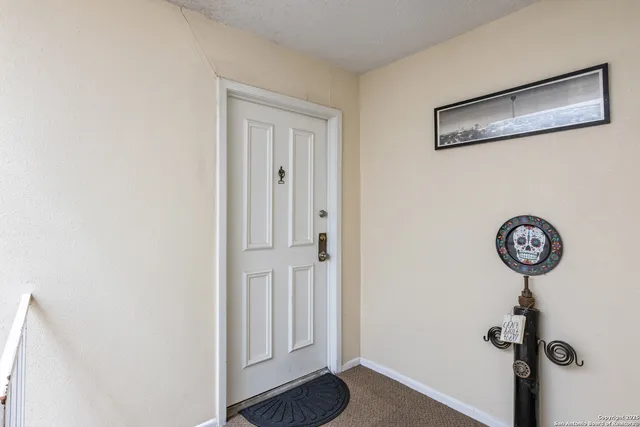 a view of a hallway with a elevator