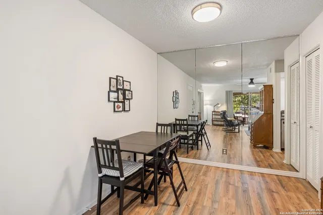 a view of a dining room with furniture
