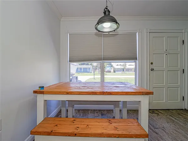 a room with a table and a window