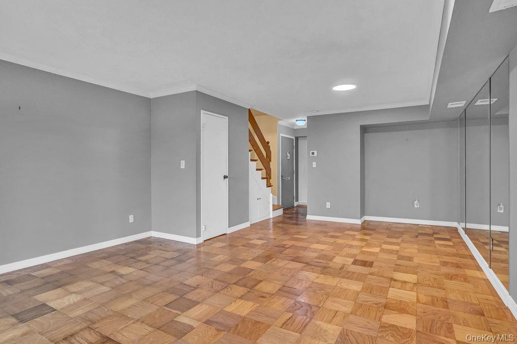311 Mariners Way Copiague, NY 11726 - Photo 2 of 21 a view of an empty room