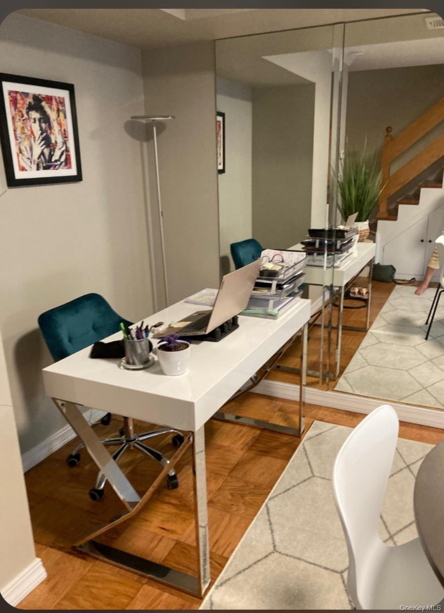 311 Mariners Way Copiague, NY 11726 - Photo 7 of 21 a view of a workspace with furniture