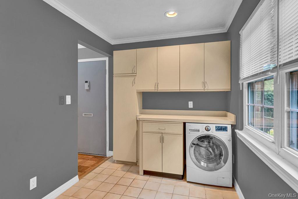 311 Mariners Way Copiague, NY 11726 - Photo 10 of 21 a utility room with dryer and washer