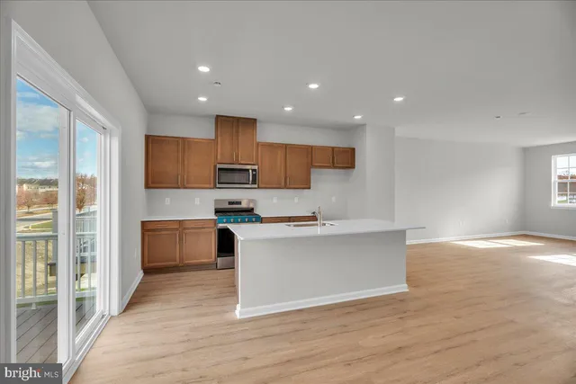a view of an empty room with a sliding door