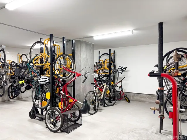 a car parked in front of a brick building