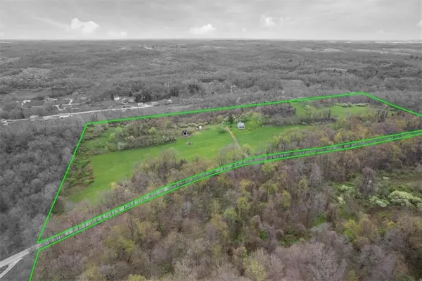 a view of a yard with an outdoor space