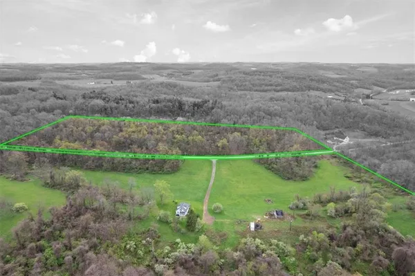 a view of a lake with a big yard