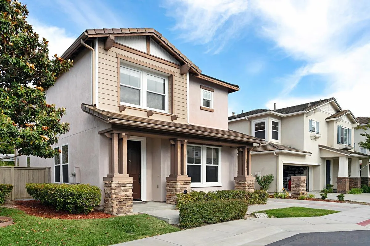 12253 Pepper Tree Lane Poway, CA 92064 - Photo 39 of 39 a front view of a house with a yard