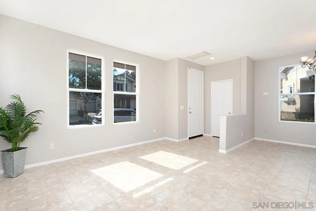 12253 Pepper Tree Lane Poway, CA 92064 - Photo 4 of 39 an empty room with windows