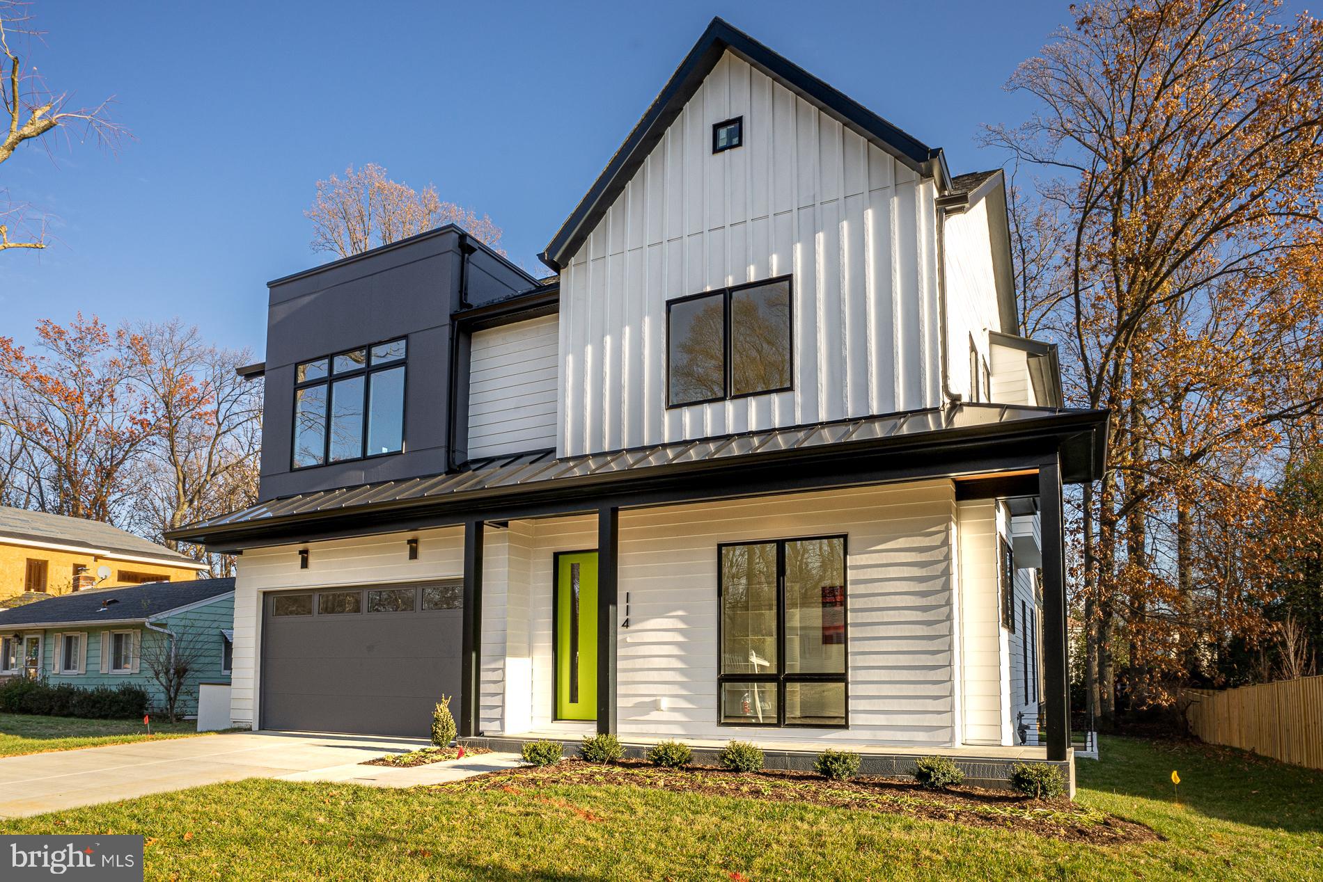 114 Tapawingo Road Southwest Vienna, VA 22180 - Photo 3 of 67 White siding, black windows & trim, gray accent