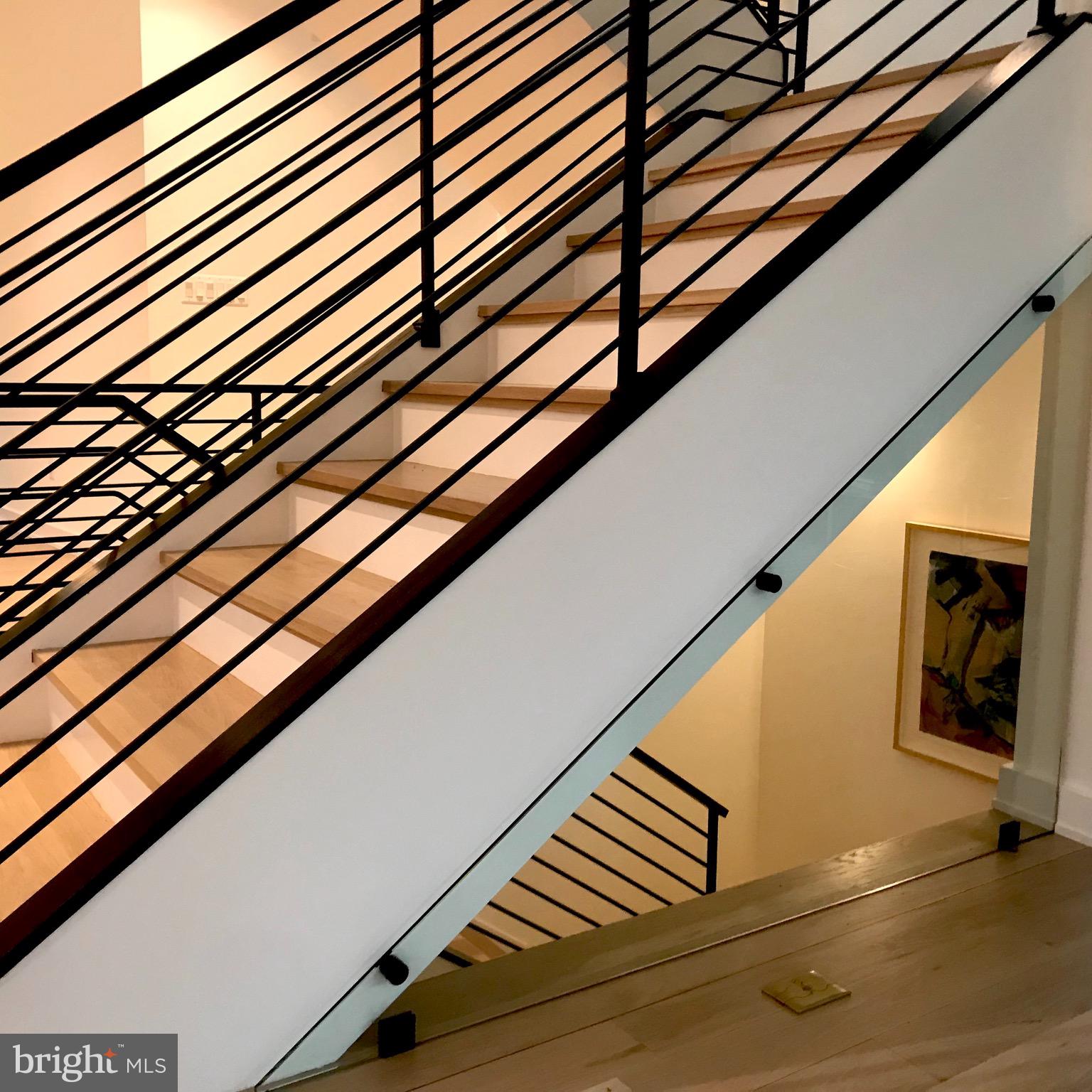 114 Tapawingo Road Southwest Vienna, VA 22180 - Photo 23 of 67 Temper glass panel lets light into lower level