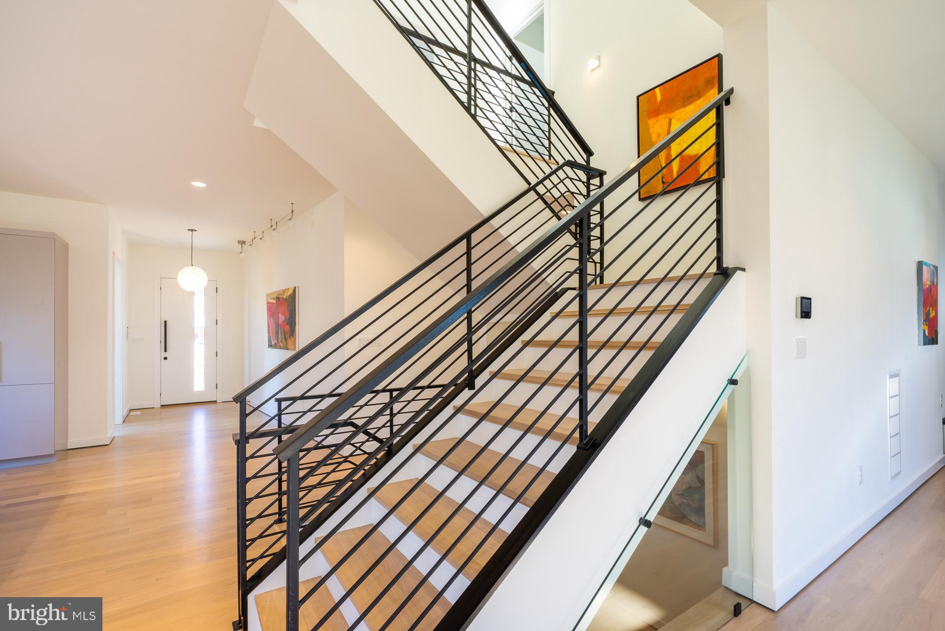114 Tapawingo Road Southwest Vienna, VA 22180 - Photo 24 of 67 Tempered Glass allows light for lower stairs
