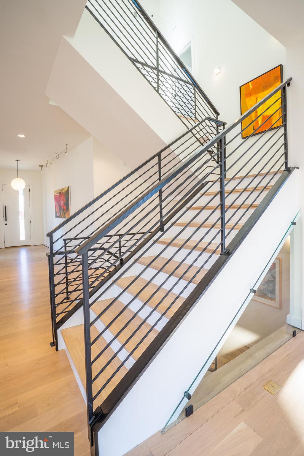 114 Tapawingo Road Southwest Vienna, VA 22180 - Photo 29 of 67 Steel rail system with black painted oak cap
