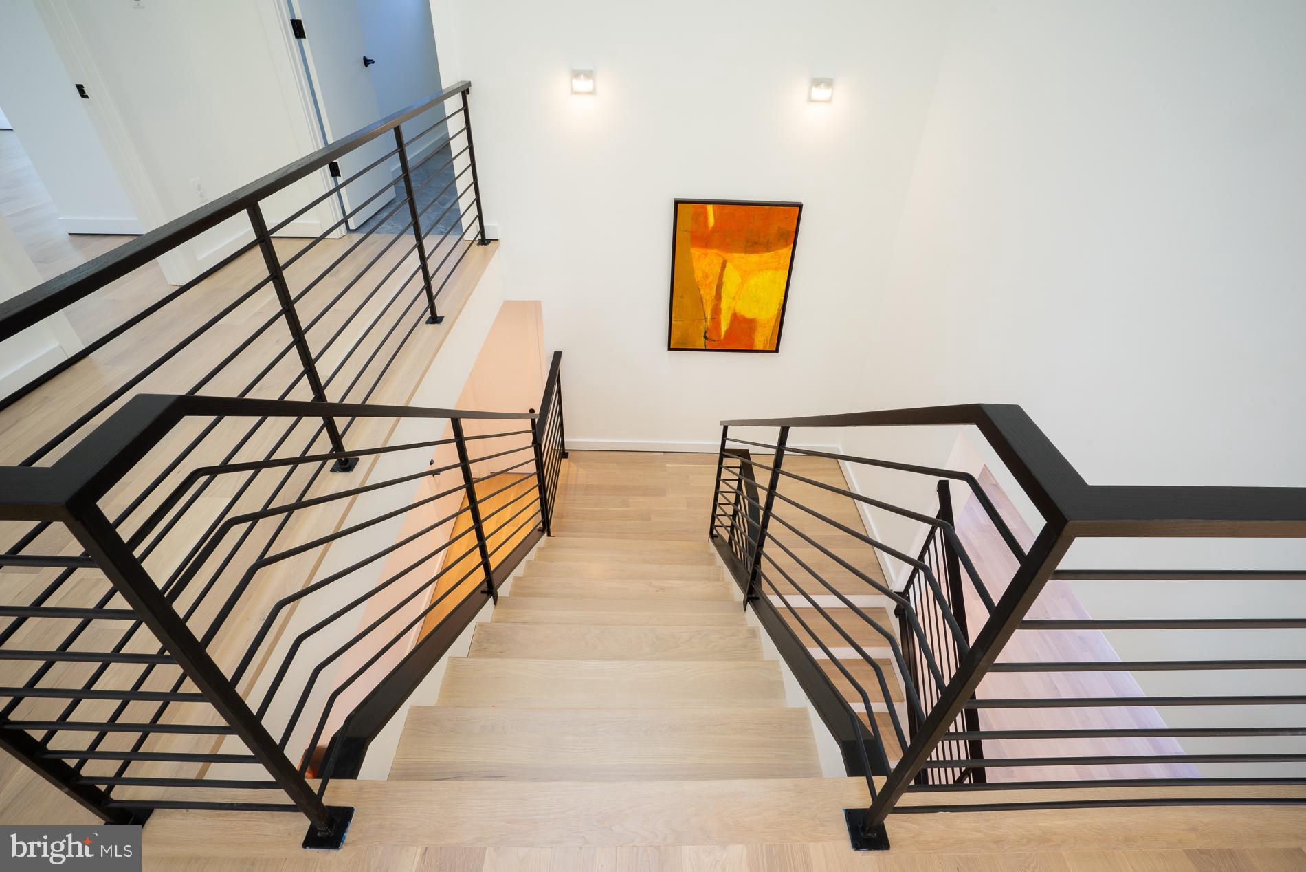 114 Tapawingo Road Southwest Vienna, VA 22180 - Photo 33 of 67 Beautiful light fixtures above stair landing