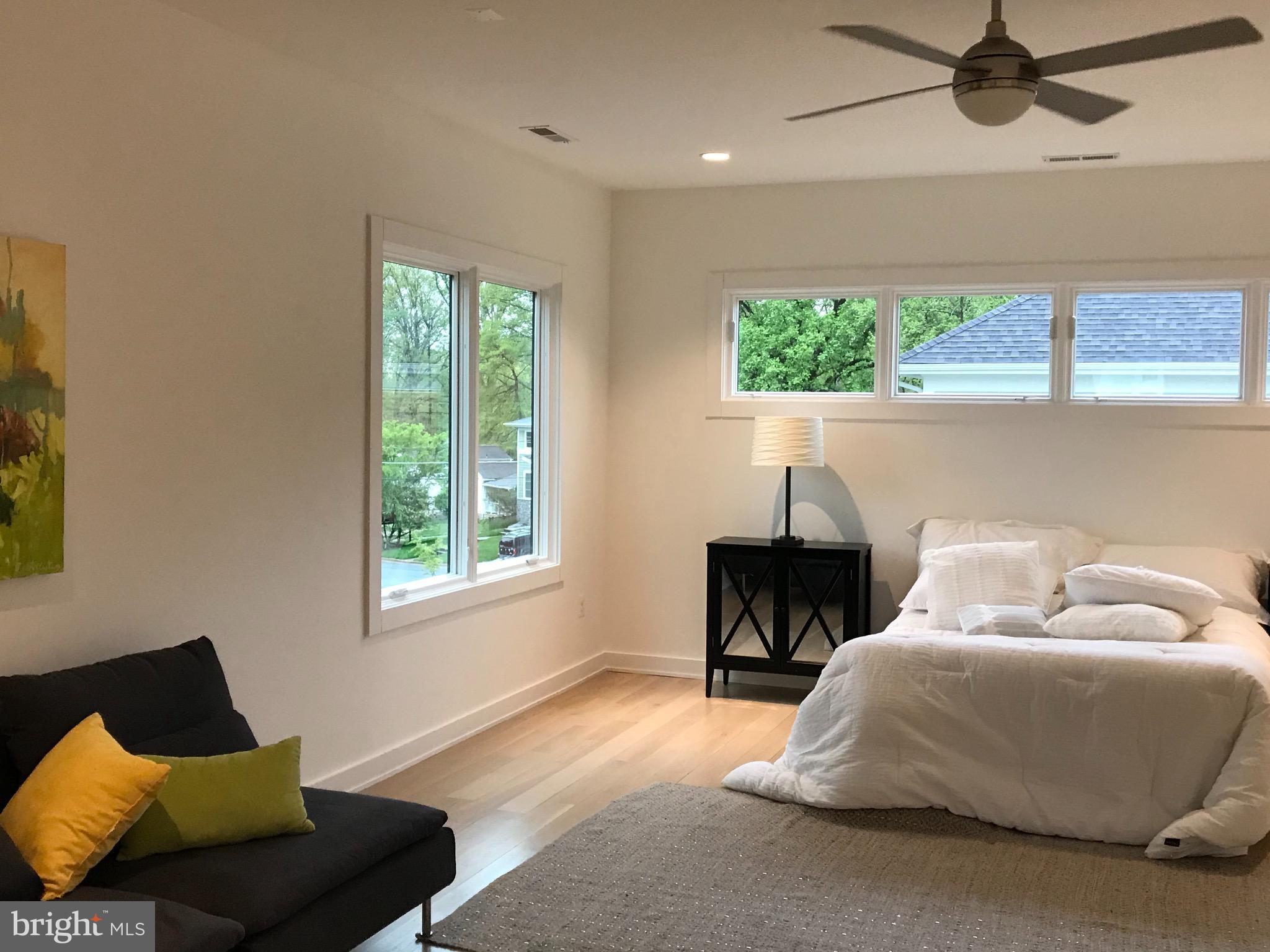 114 Tapawingo Road Southwest Vienna, VA 22180 - Photo 35 of 67 Master bedroom, high windows bring light, privacy