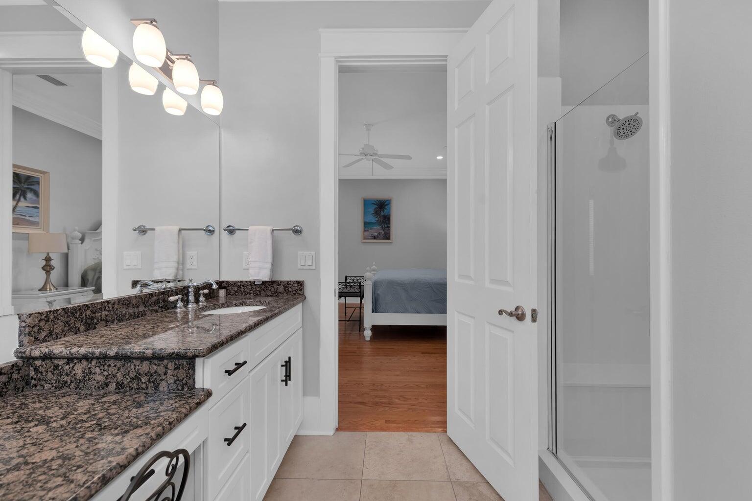 18 Beach Bike Way Inlet Beach, FL 32461 - Photo 13 of 80 a bathroom with a granite countertop sink a mirror and a shower