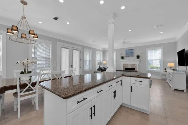 a bedroom with furniture and a wooden floor