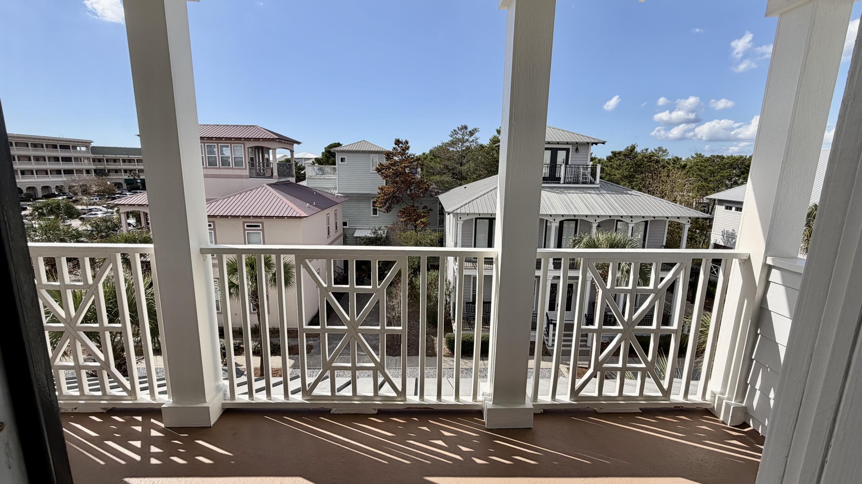 18 Beach Bike Way Inlet Beach, FL 32461 - Photo 64 of 80 a view of a balcony with a floor to ceiling window