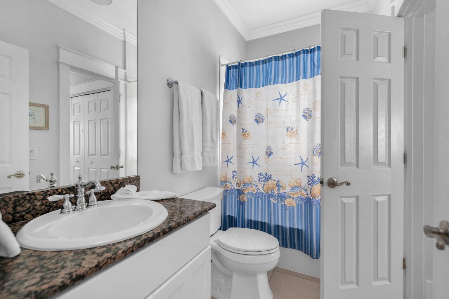 18 Beach Bike Way Inlet Beach, FL 32461 - Photo 70 of 80 a bathroom with a granite countertop sink and a mirror