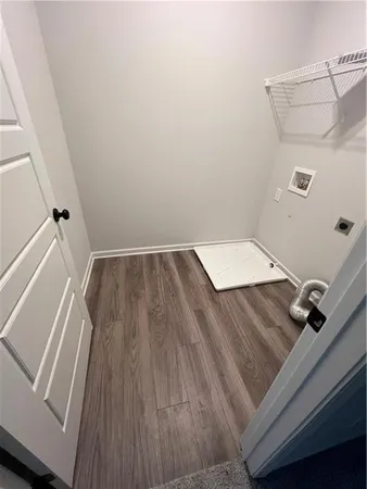 wooden floor with staircase