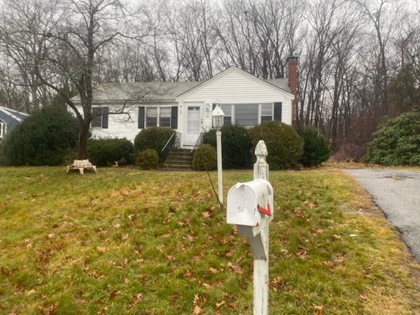 56 Robinson Road Woburn, MA 01801 - Photo 1 of 1 a front view of a house with yard